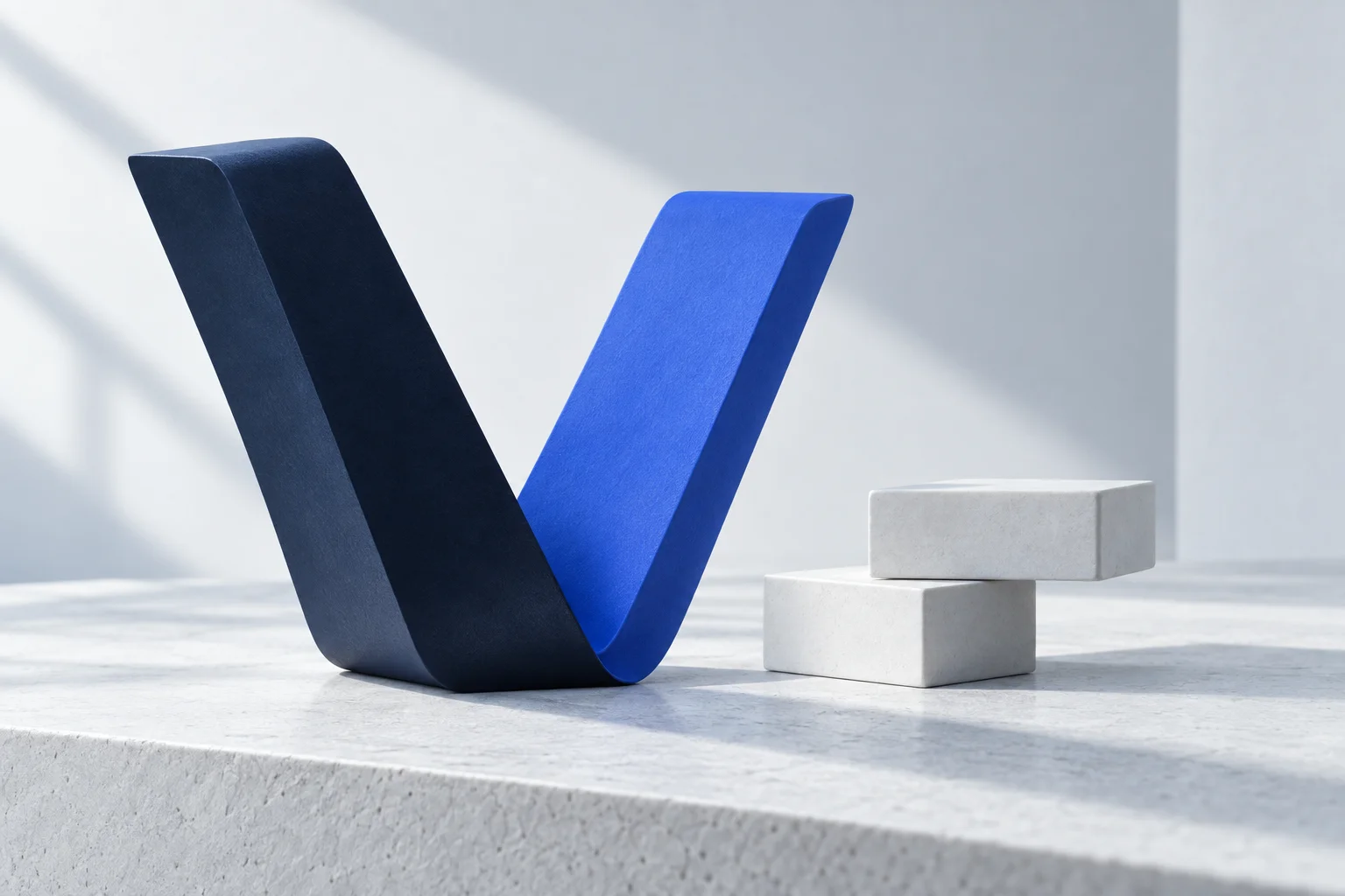 Blue sculptural composition inspired by the VALTESSA symbol